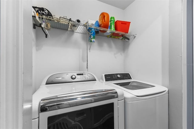 1203 Desmond St, Port Charlotte, FL 33952 - clothes washing area featuring laundry area and washer and clothes dryer