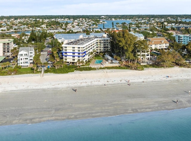 aerial view featuring a water view and a view of the beach