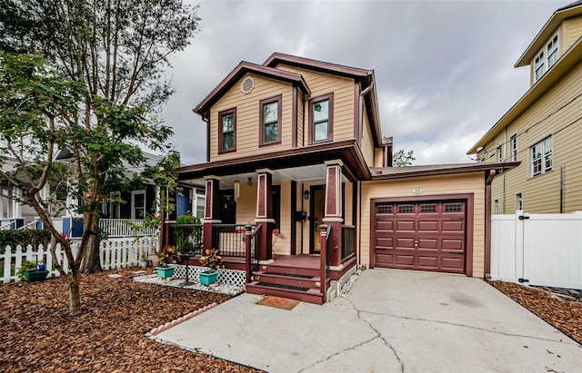 view of front of home featuring a garage and covered porch