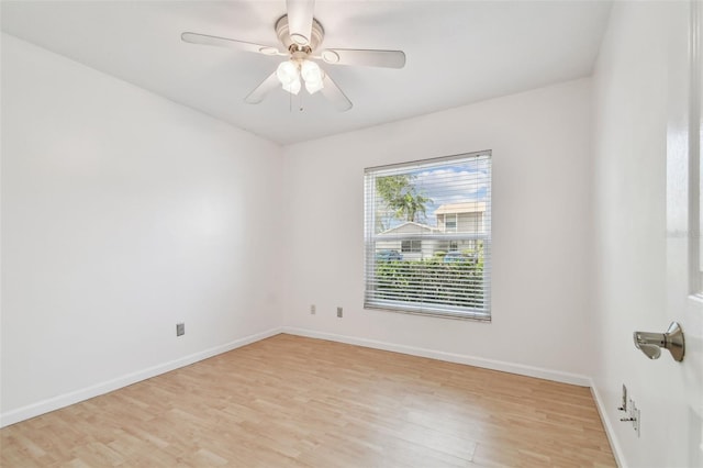 empty room with light hardwood / wood-style flooring and ceiling fan