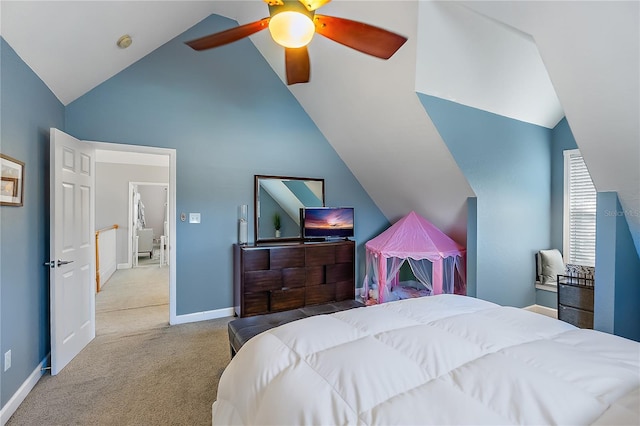 bedroom featuring vaulted ceiling, light colored carpet, and ceiling fan