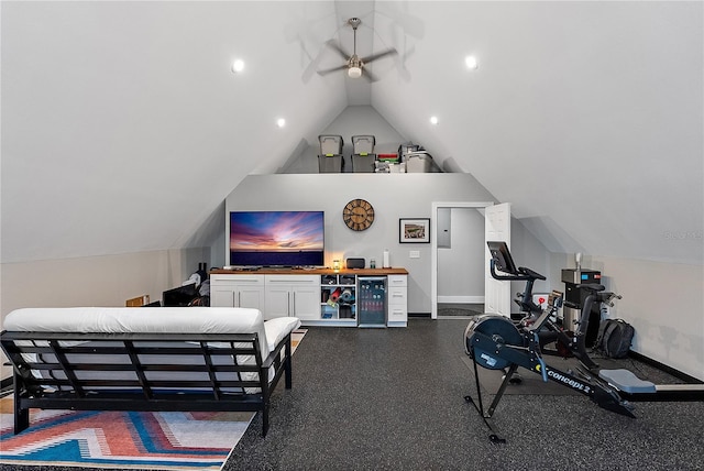 workout room featuring lofted ceiling and ceiling fan