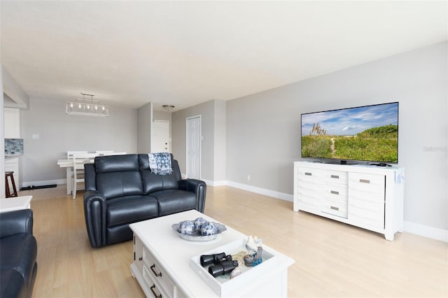 living room featuring light wood-type flooring