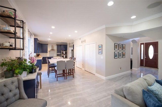 dining area with crown molding