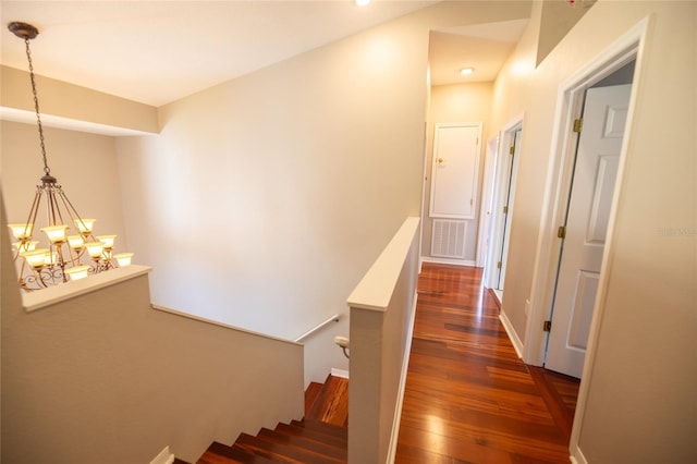 stairway featuring wood-type flooring