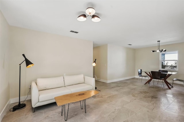 living room featuring a chandelier