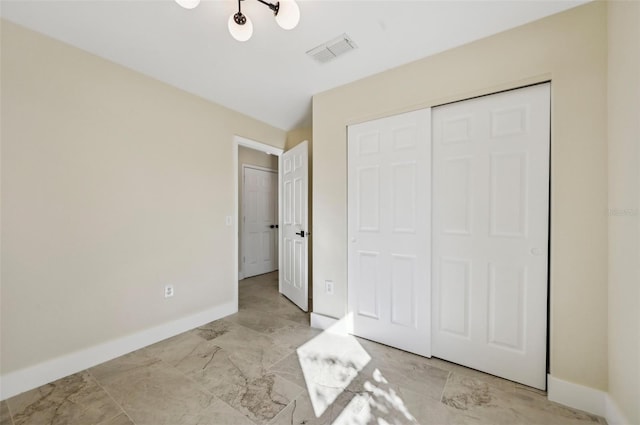 unfurnished bedroom featuring a closet