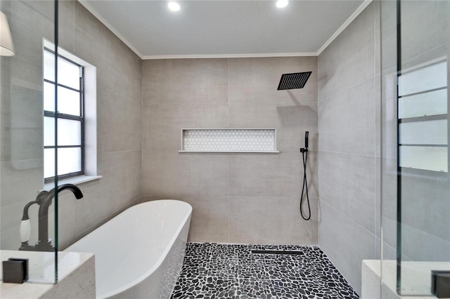 bathroom featuring plus walk in shower, a healthy amount of sunlight, and crown molding