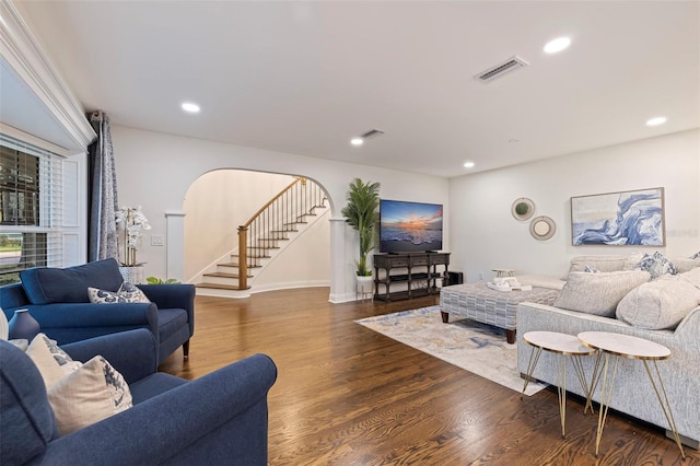 living room featuring dark hardwood / wood-style floors