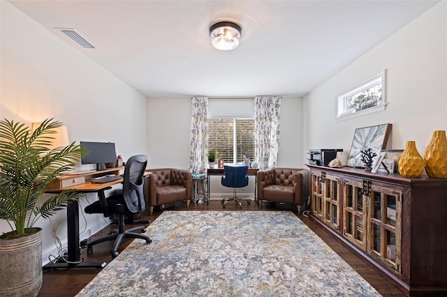 office space with dark hardwood / wood-style flooring