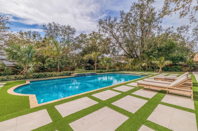 view of swimming pool featuring a patio area