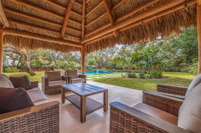 view of patio / terrace featuring an outdoor living space and a gazebo