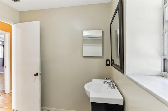 bathroom featuring tile patterned floors and vanity