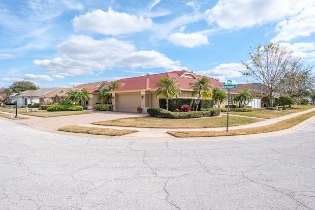 single story home featuring a garage