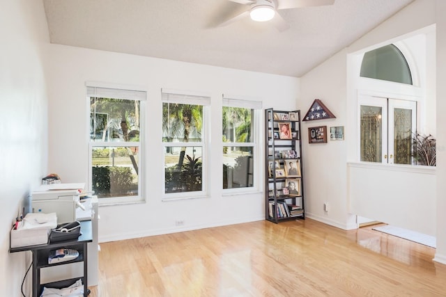 sitting room featuring ceiling fan and light wood-type flooring