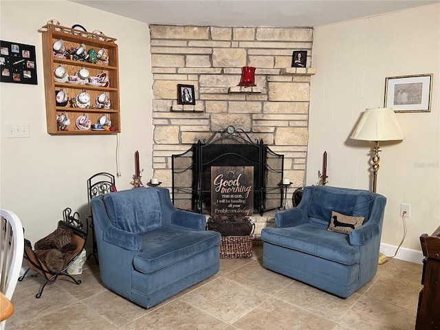 sitting room featuring a fireplace