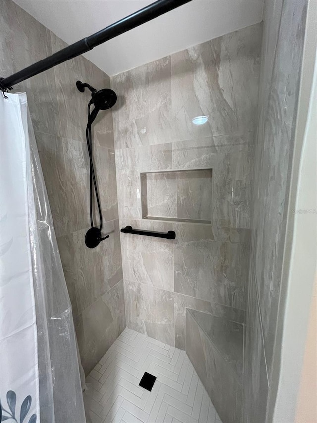 full bathroom with a shower stall