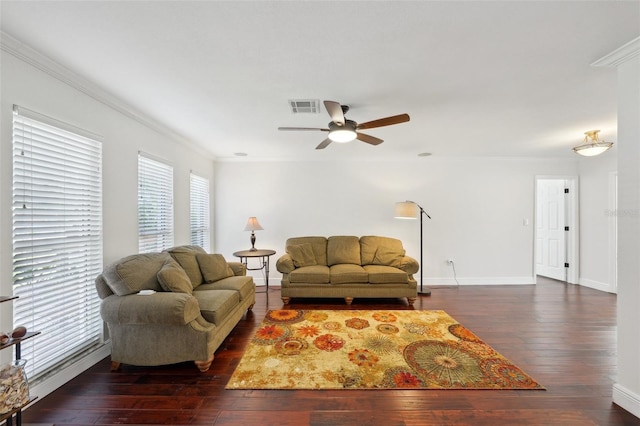 living room featuring crown molding, dark wood-type flooring, and ceiling fan