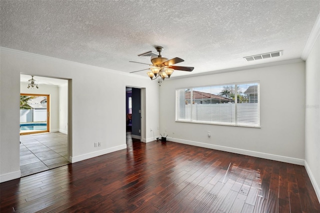 unfurnished room with crown molding, plenty of natural light, and hardwood / wood-style flooring