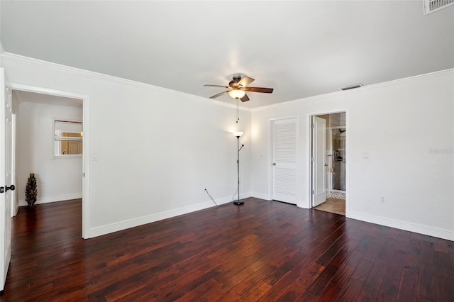 unfurnished room with crown molding, ceiling fan, and dark hardwood / wood-style floors