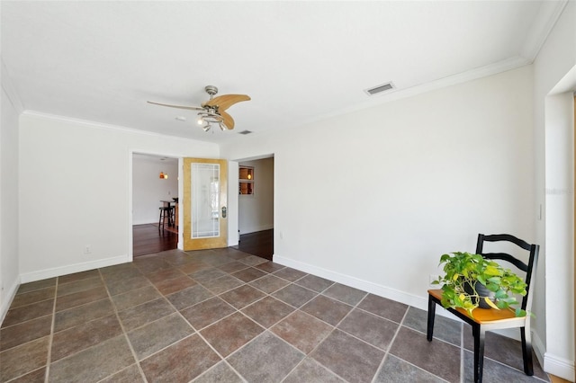 unfurnished room featuring crown molding and ceiling fan