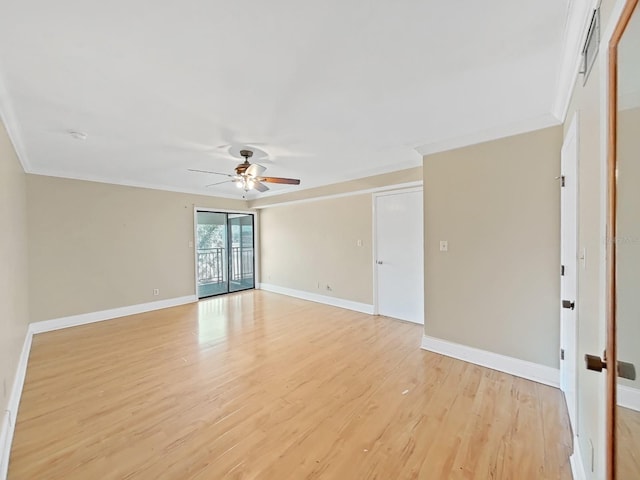 empty room featuring ceiling fan, ornamental molding, and light hardwood / wood-style flooring