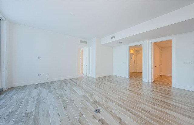 empty room featuring light hardwood / wood-style floors