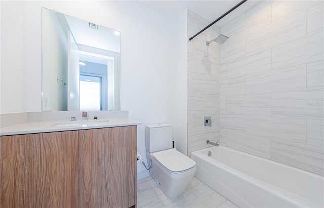 full bathroom with vanity, toilet, and tiled shower / bath combo