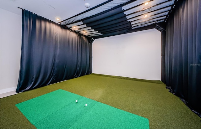 playroom with golf simulator and carpet