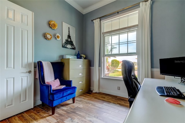 office space featuring crown molding, baseboards, and wood finished floors