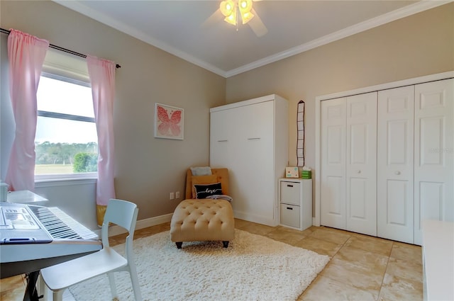 office with a ceiling fan, crown molding, and baseboards