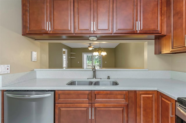 kitchen with ceiling fan with notable chandelier, stainless steel dishwasher, sink, and stove