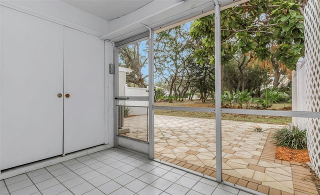 entryway featuring light tile patterned flooring