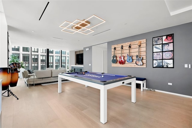 1000 Water St Unit 1002, Tampa, FL 33602 - recreation room featuring billiards, floor to ceiling windows, and light hardwood / wood-style flooring