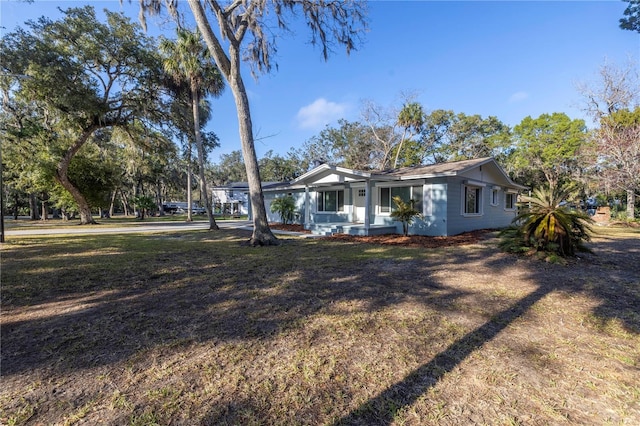 view of front of house with a front yard