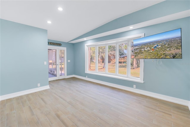 unfurnished room featuring recessed lighting, vaulted ceiling, baseboards, and wood finished floors