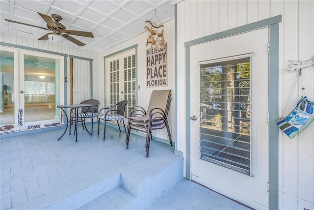 exterior space featuring a ceiling fan and french doors