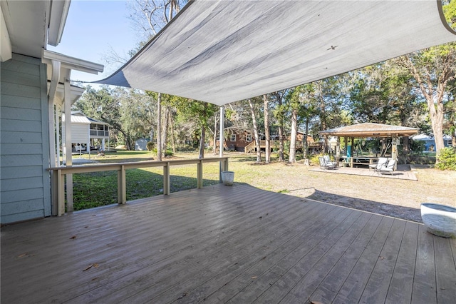 wooden deck with a gazebo