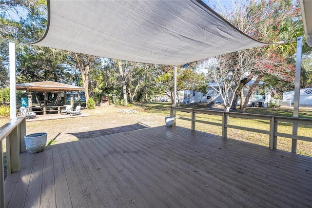 wooden deck with a gazebo