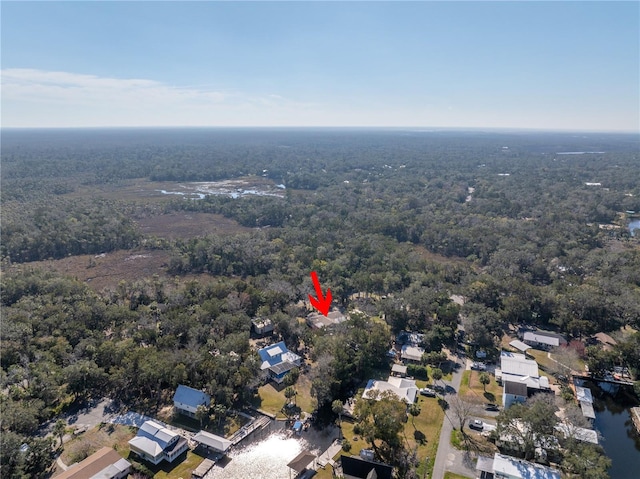 drone / aerial view with a view of trees