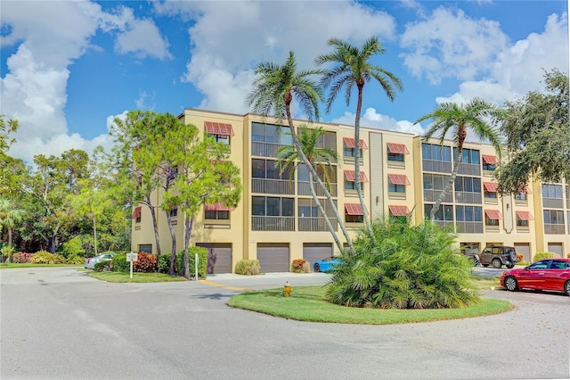view of building exterior featuring an attached garage