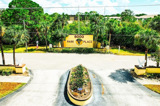 view of community featuring curved driveway