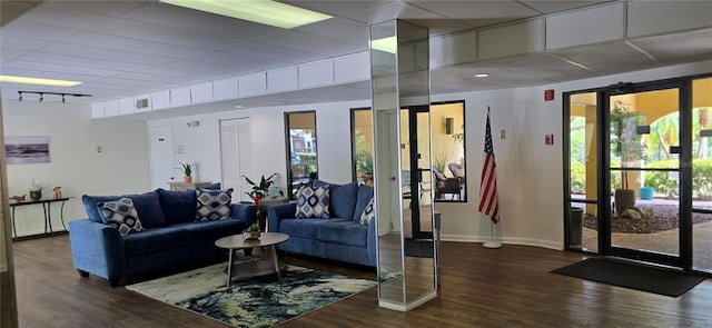 community lobby featuring a paneled ceiling