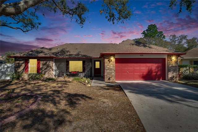 ranch-style home with a garage