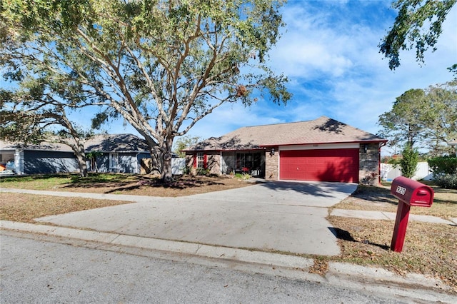 single story home with a garage