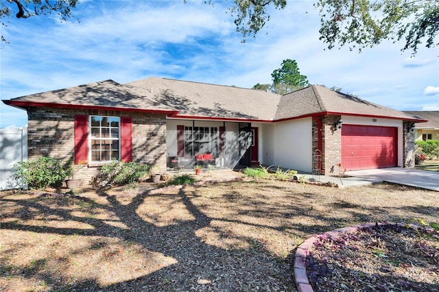 ranch-style home featuring a garage