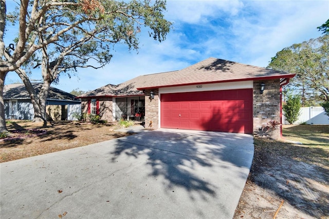 ranch-style home with a garage