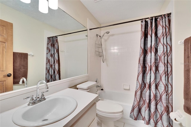 full bathroom with vanity, toilet, shower / bath combination with curtain, and a textured ceiling