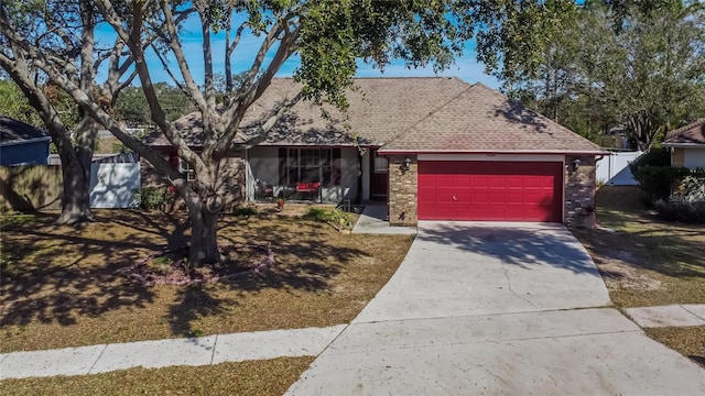 single story home with a garage