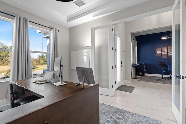 office space featuring light tile patterned floors, ornamental molding, a raised ceiling, and french doors